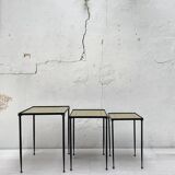 Suite of metal and glass nesting tables.