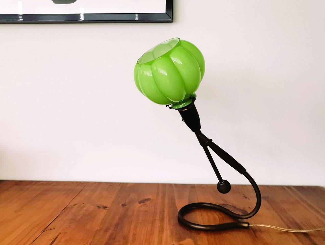 Modernist green cased glass and brass articulated table lamp