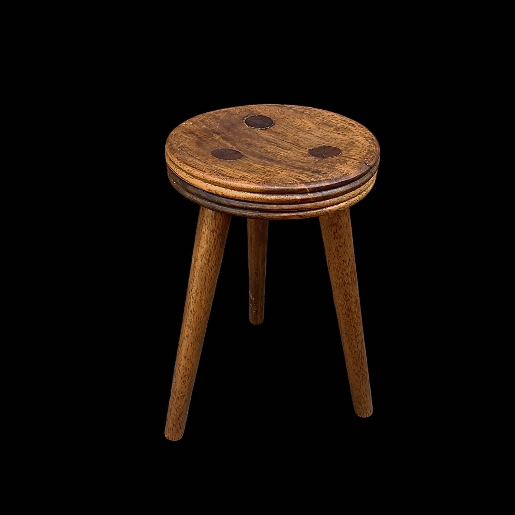 Old small wooden tripod stool