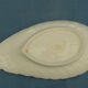 Old white ravier in shell-shaped porcelain