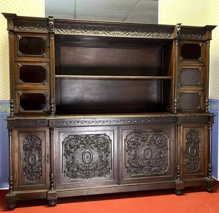Renaissance-style sideboard, entirely made of walnut and richly carved.