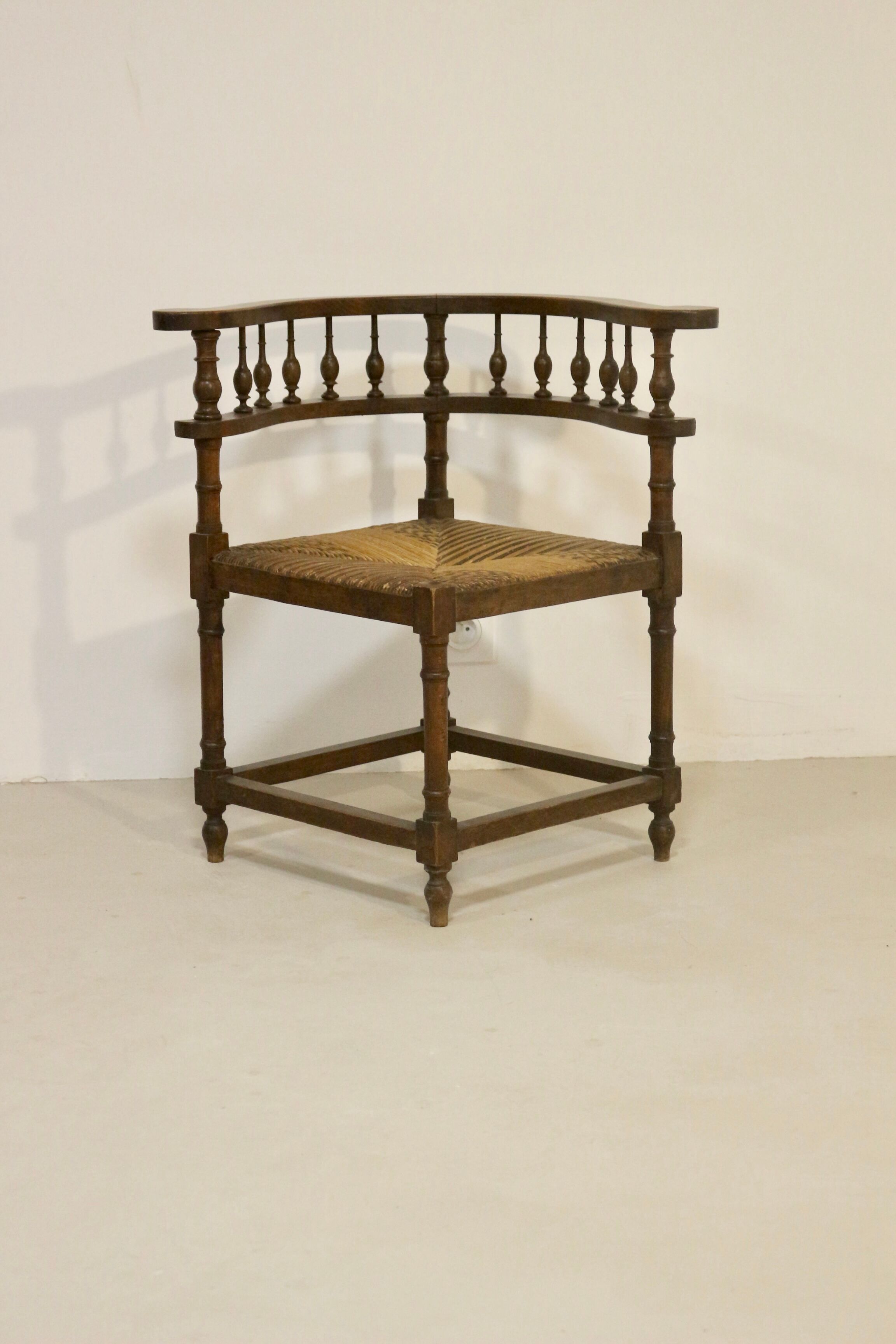 Vintage corner chair, sculpted backrest 1940