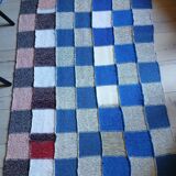 Hand knitted patchwork plaid