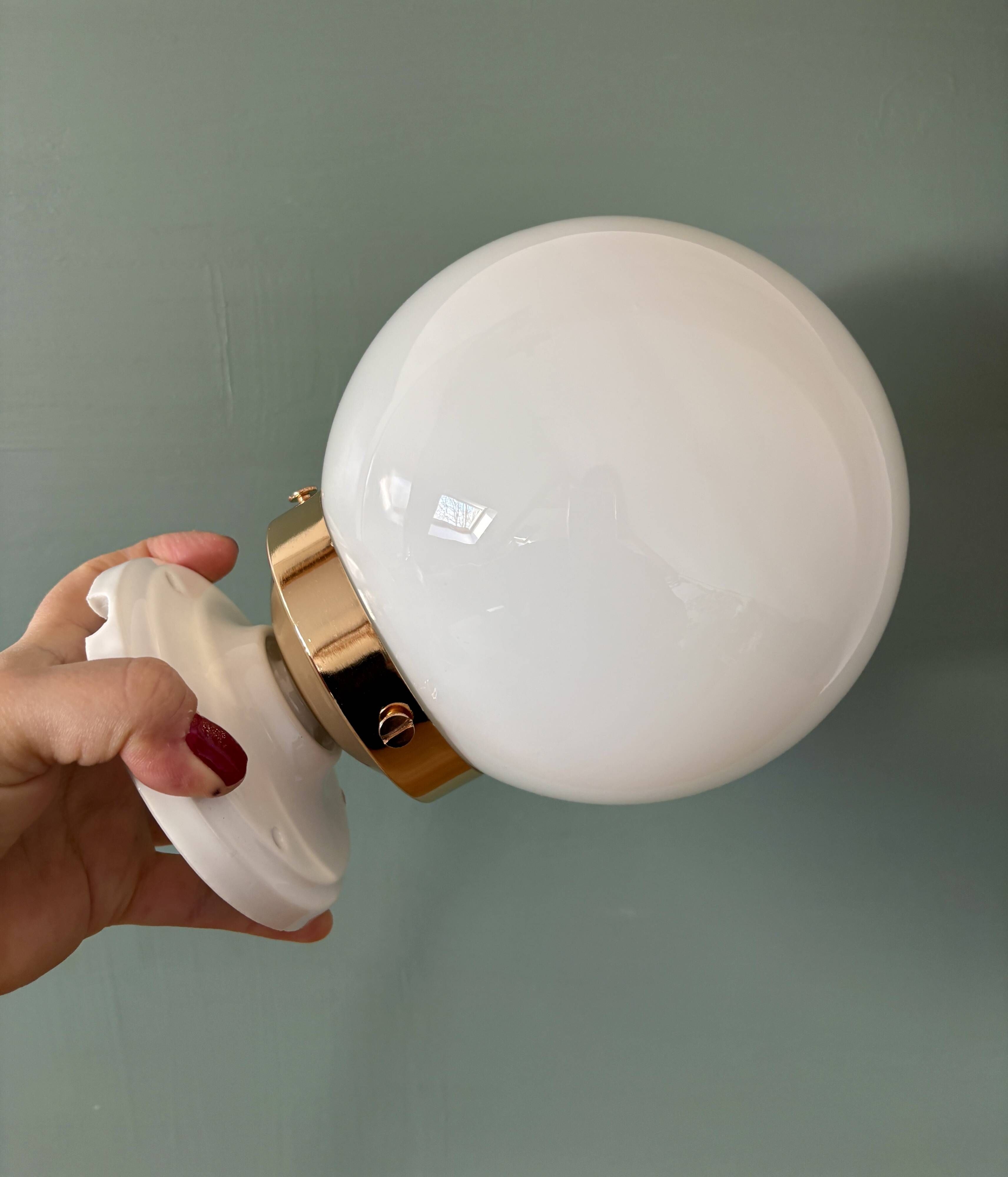 Vintage globe wall or ceiling light in white opaline.