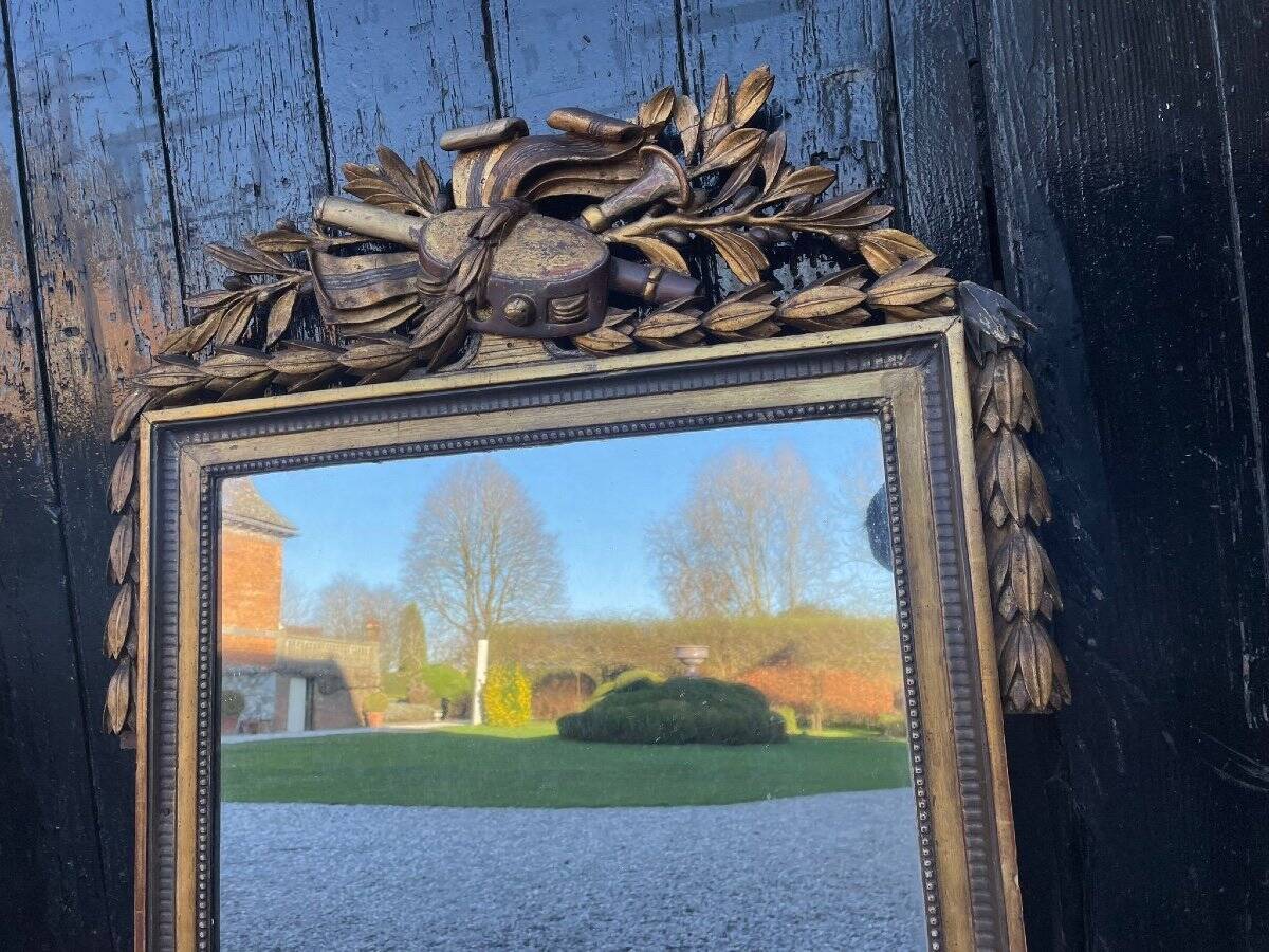 Louis XVI mirror in carved and gilded wood, 18th century
