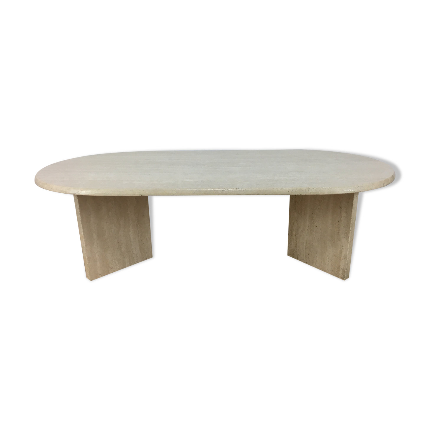 Oval coffee table in travertine