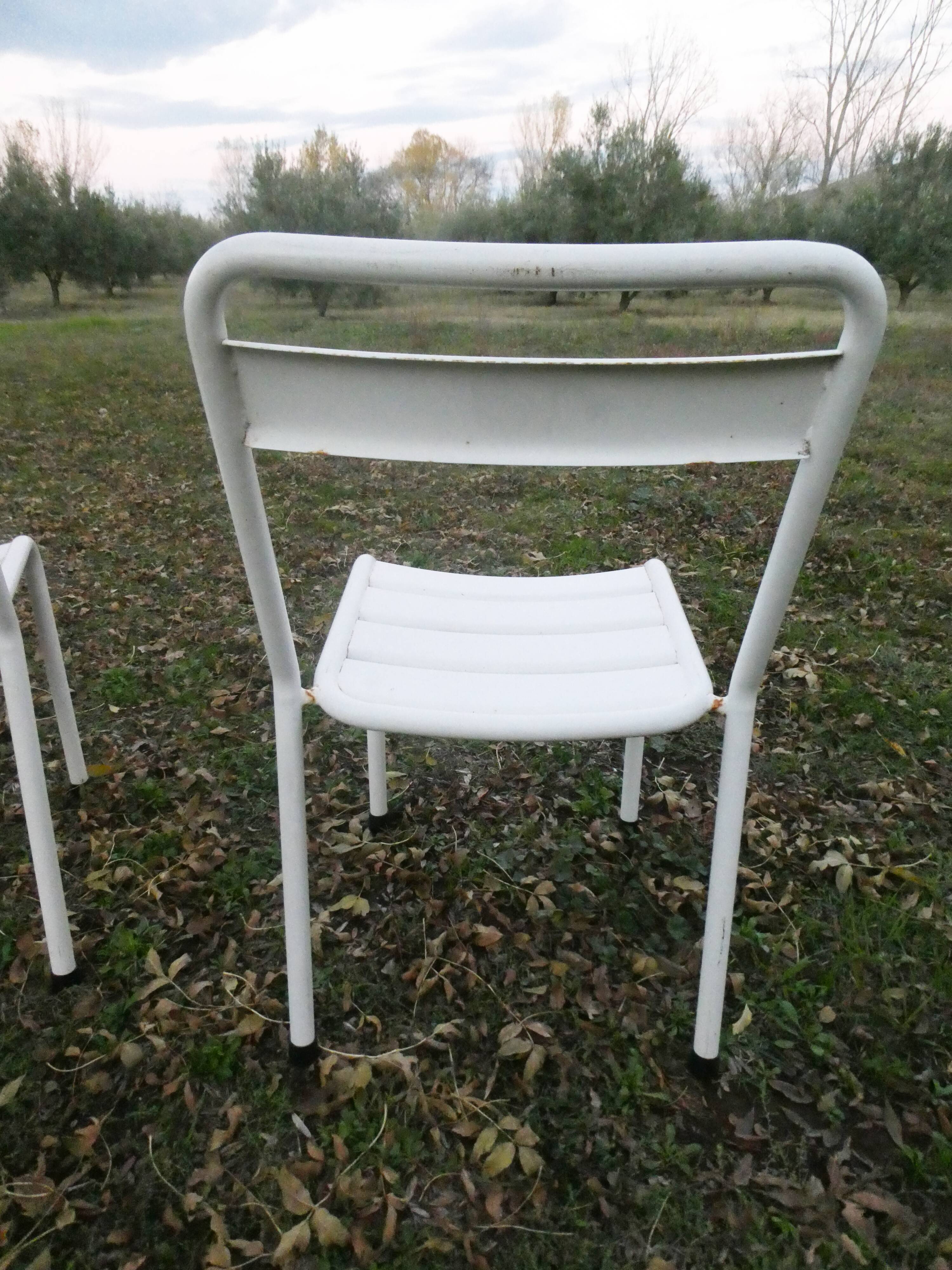 Duo of bistro style indus terrace chairs