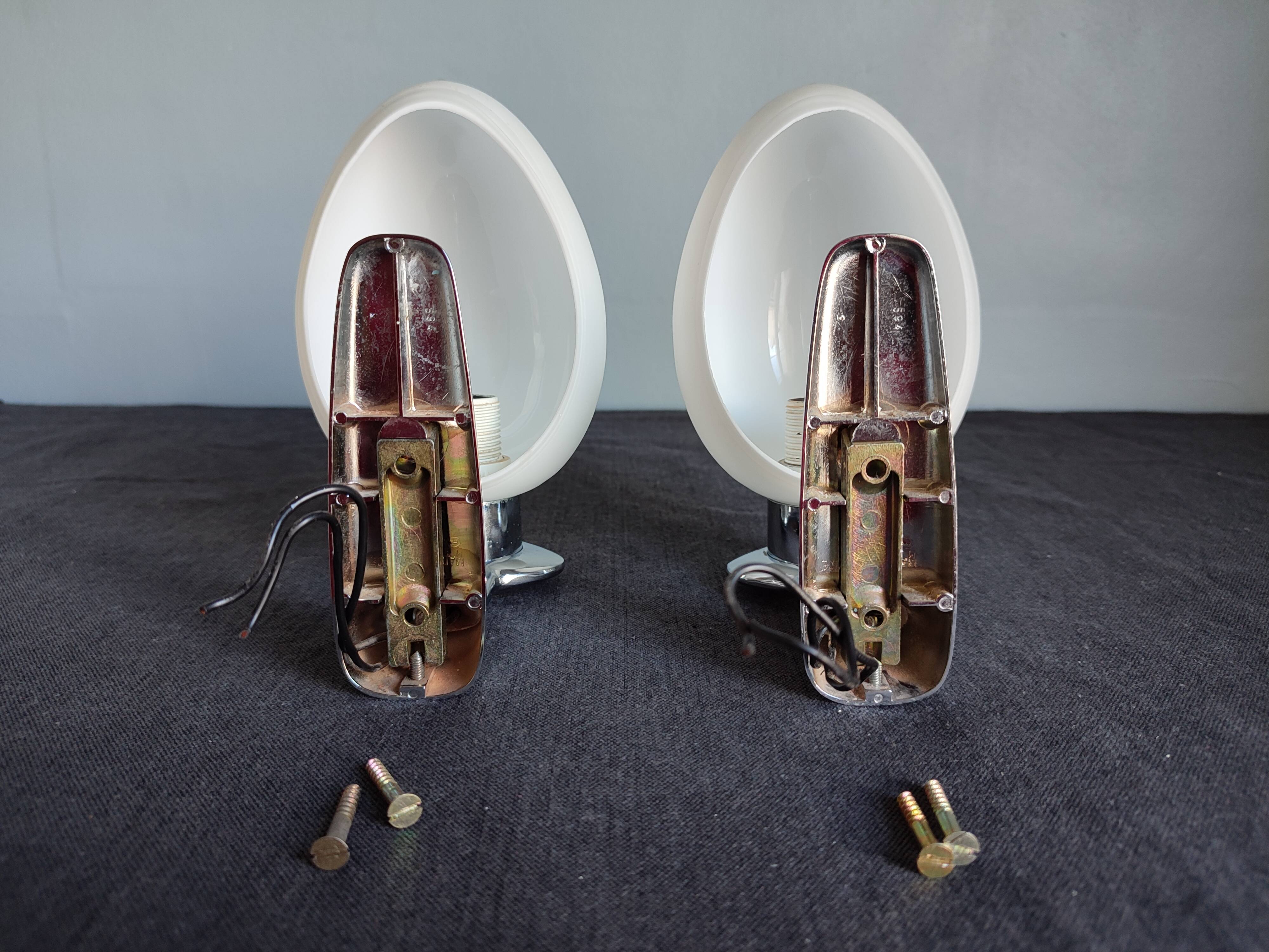 Pair of ouefs sconces in opaline and vintage chromed metal