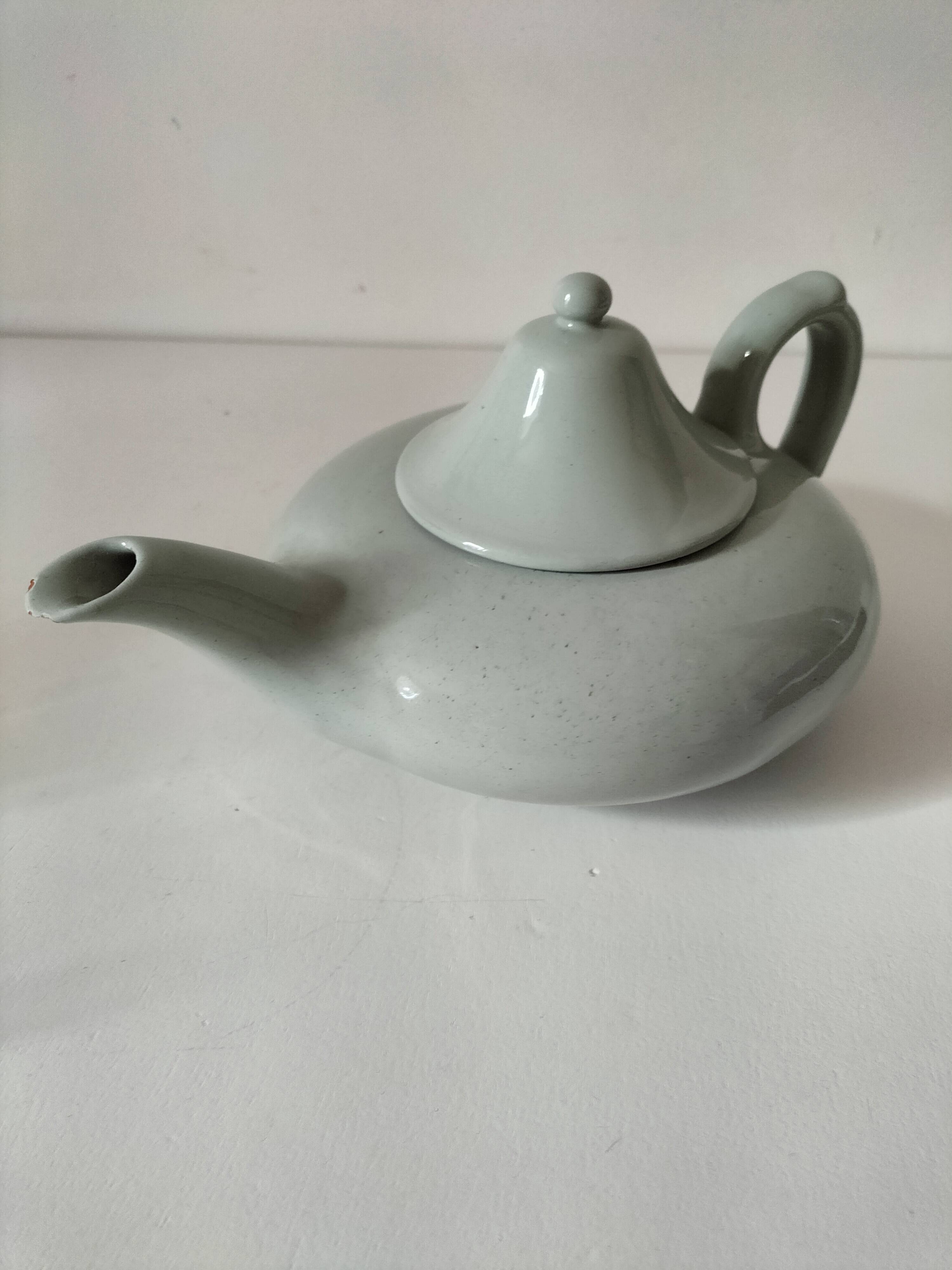 Celadon speckled glazed ceramic teapot