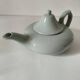 Celadon speckled glazed ceramic teapot