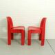 Ensemble de 2 chaises en plastique Universelle Red Joe Colombo de Kartell, Italie, 1967
