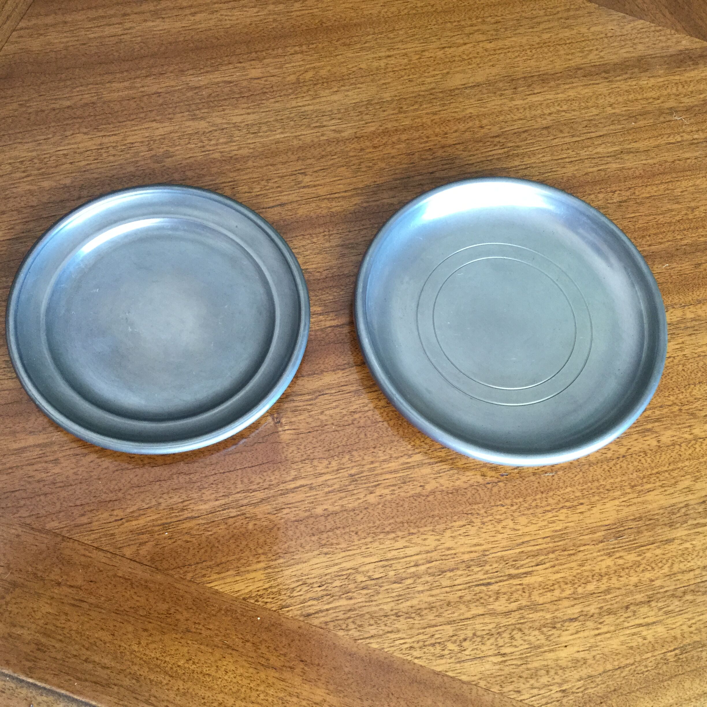 Bottle mats punched tin