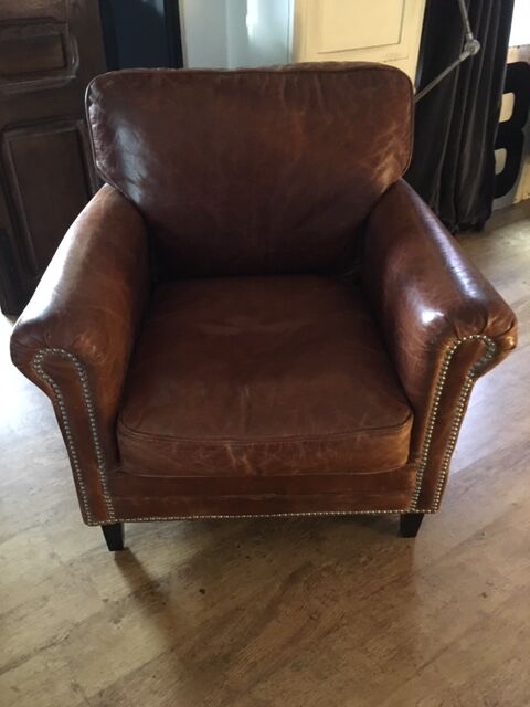 Old cuir club armchair