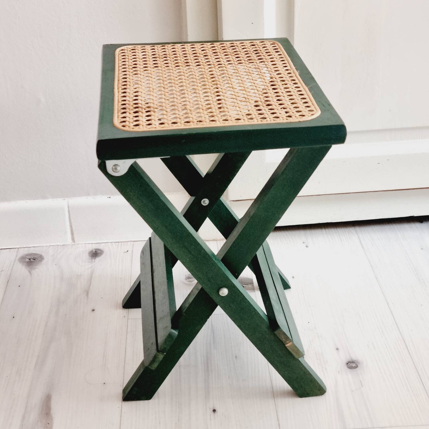 Small folding stool in green wood and cane