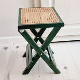 Small folding stool in green wood and cane
