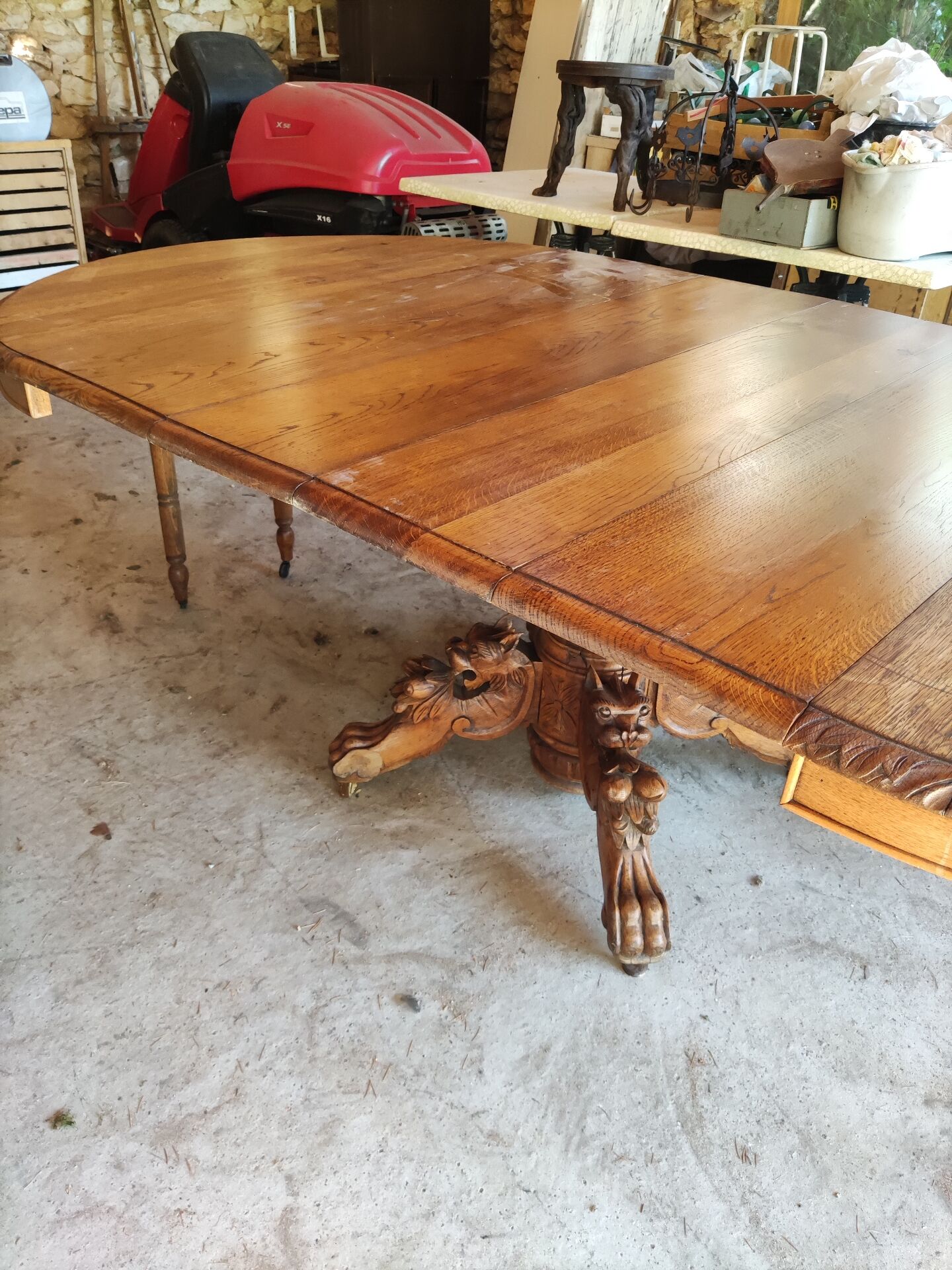Oval oak table with carved details - known as a hunting table.