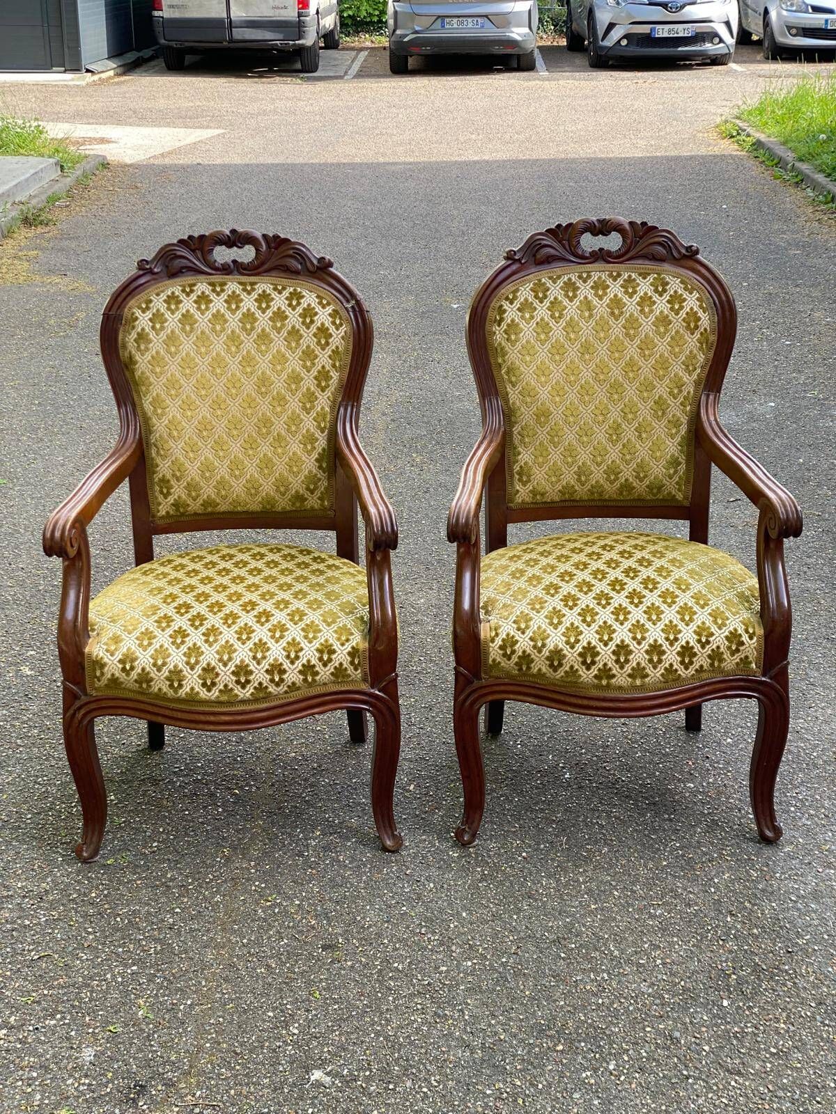 2 Louis XV cabriolet armchairs in wood and embroidered golden fabric.