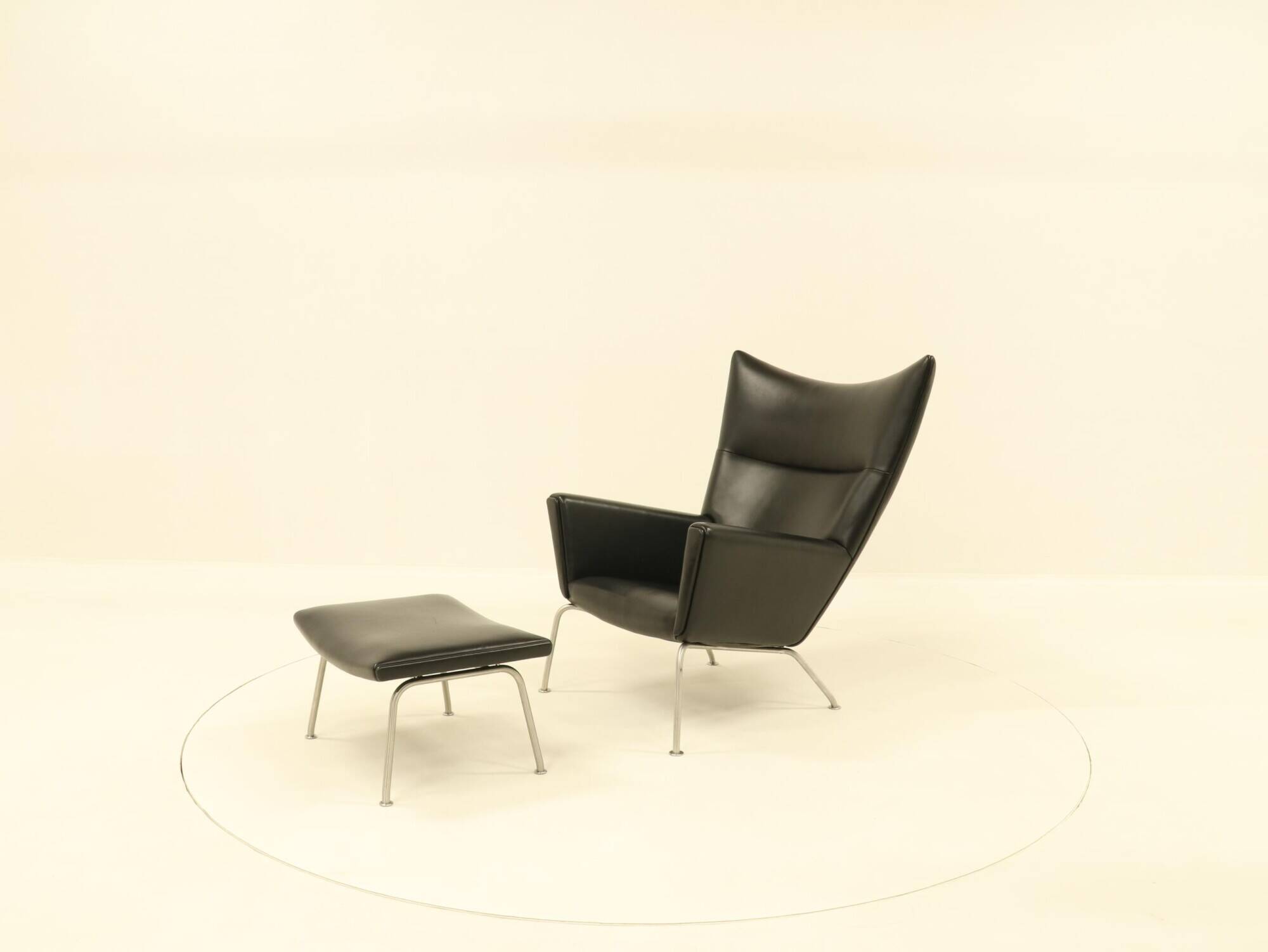 Wing chair & matching ottoman – CH445 & CH446 – by Hans Wegner