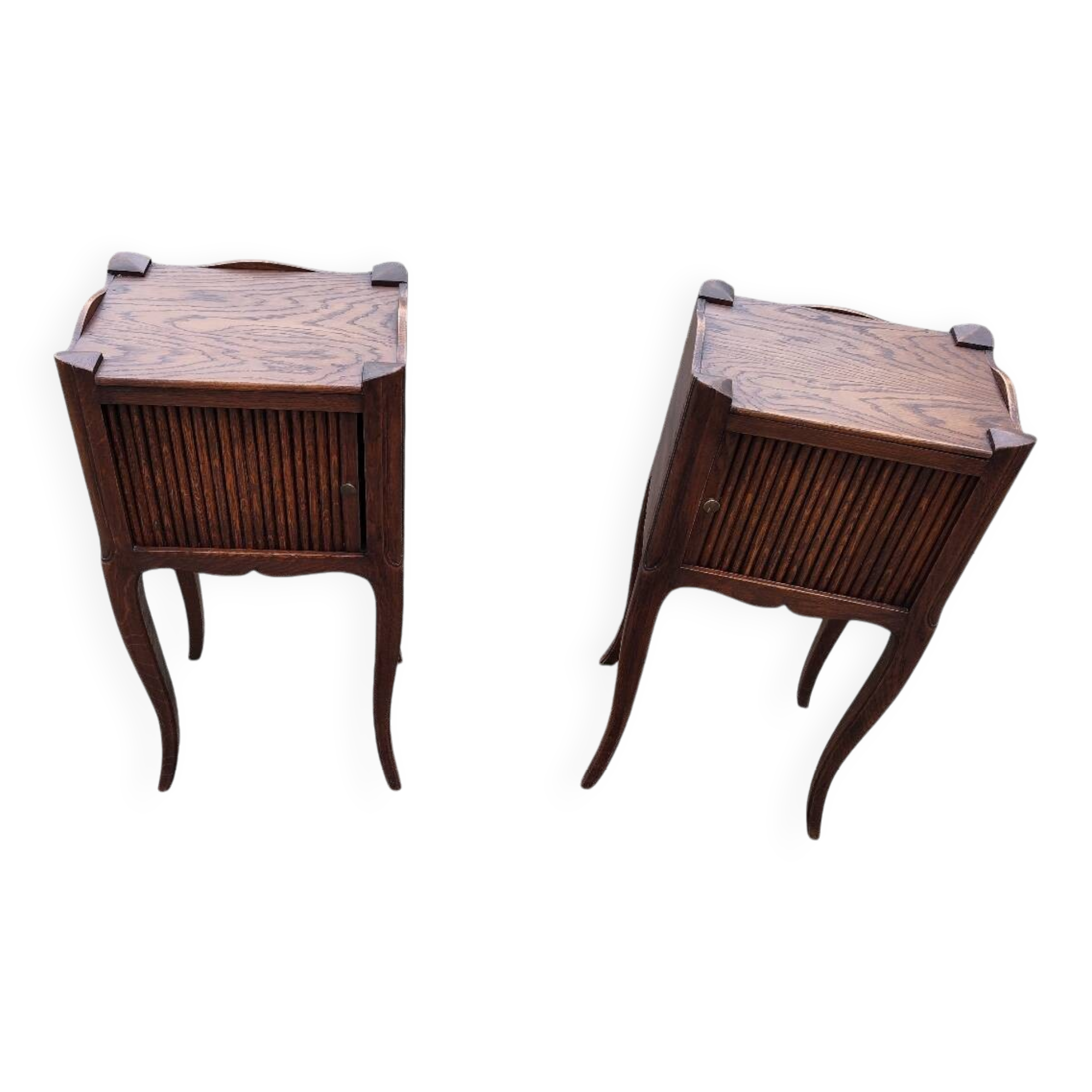 Pair of oak bedside tables with curtained niche doors