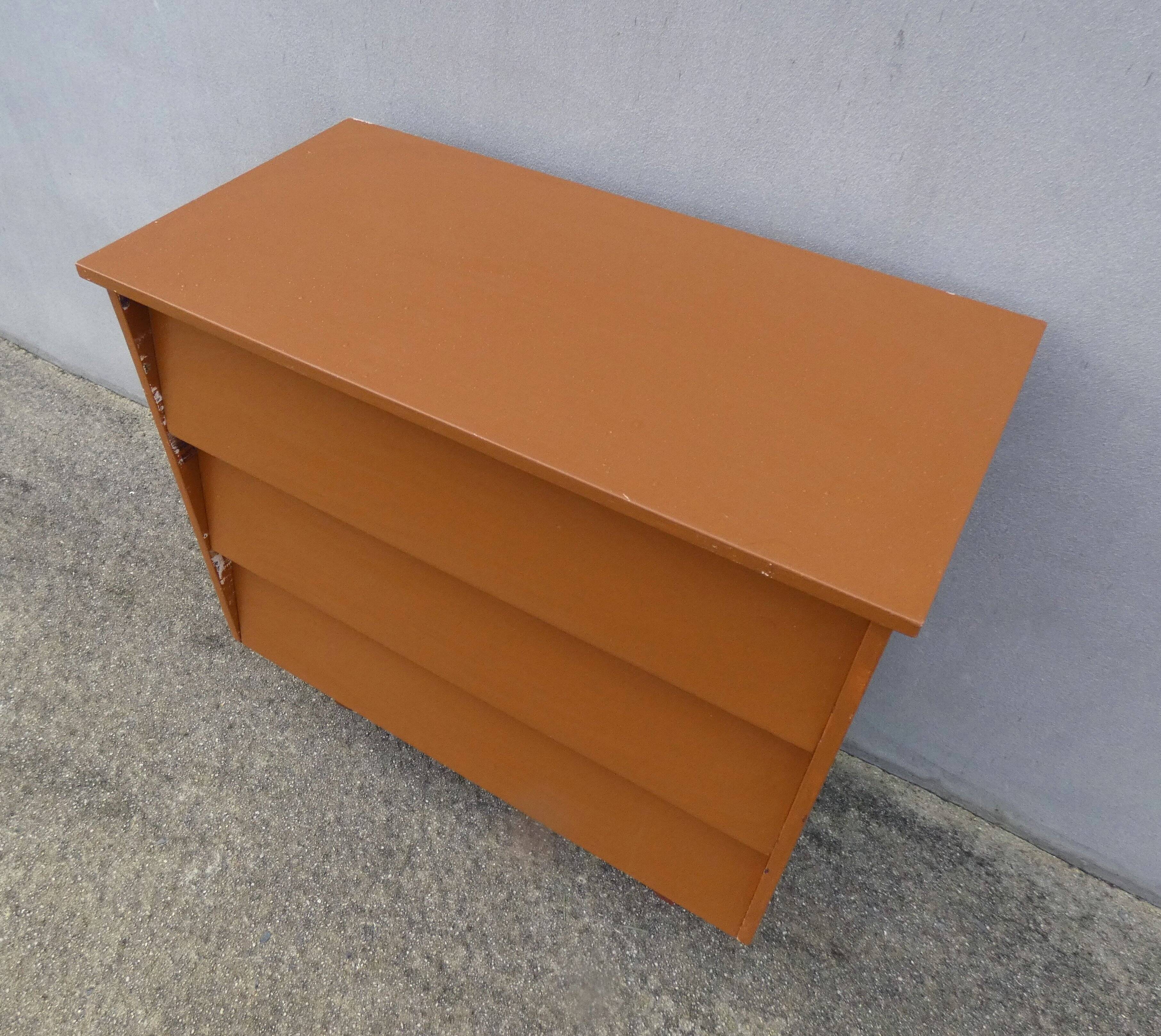 vintage wooden chest of drawers with tapered legs