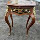 Louis XV style side table with marquetry and gilded bronze.