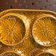 Vintage ochre earthenware artichoke dish, 6 compartments, relief flowers.