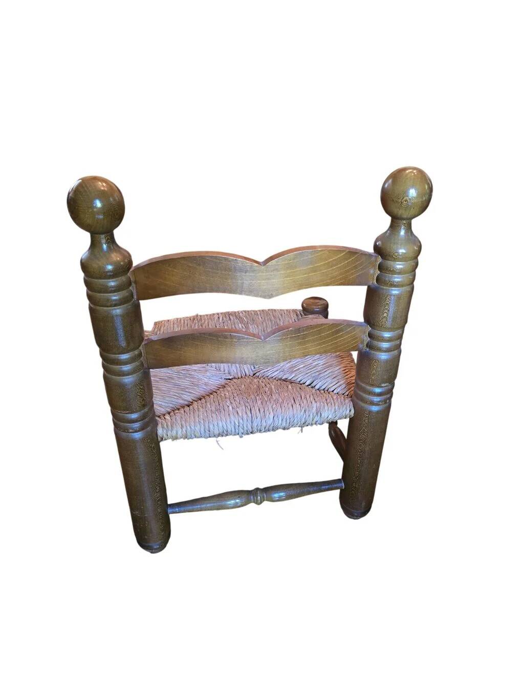 Pair of low fireplace chairs in turned wood and straw, Charles style.