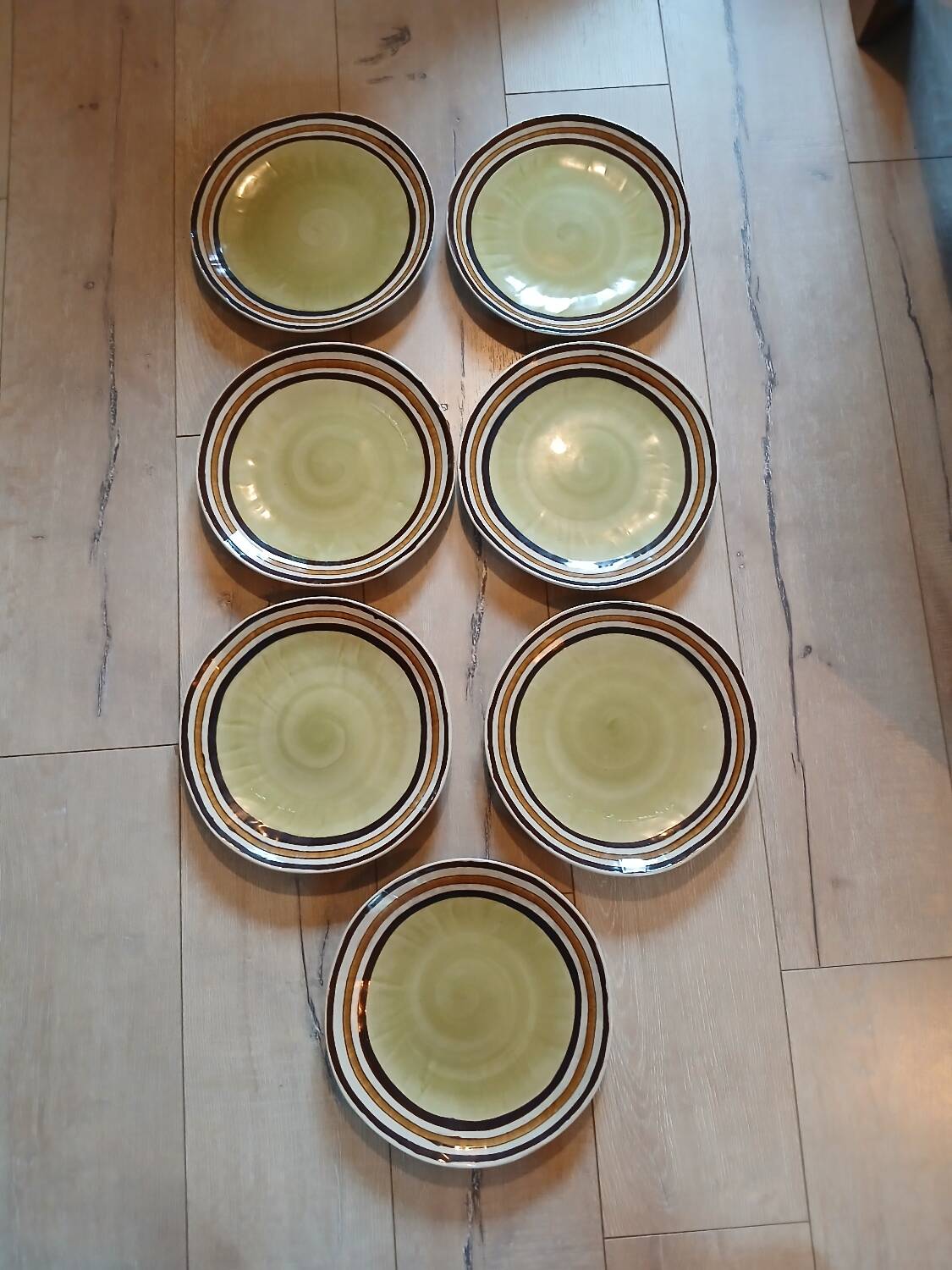 7 old stoneware flat plates