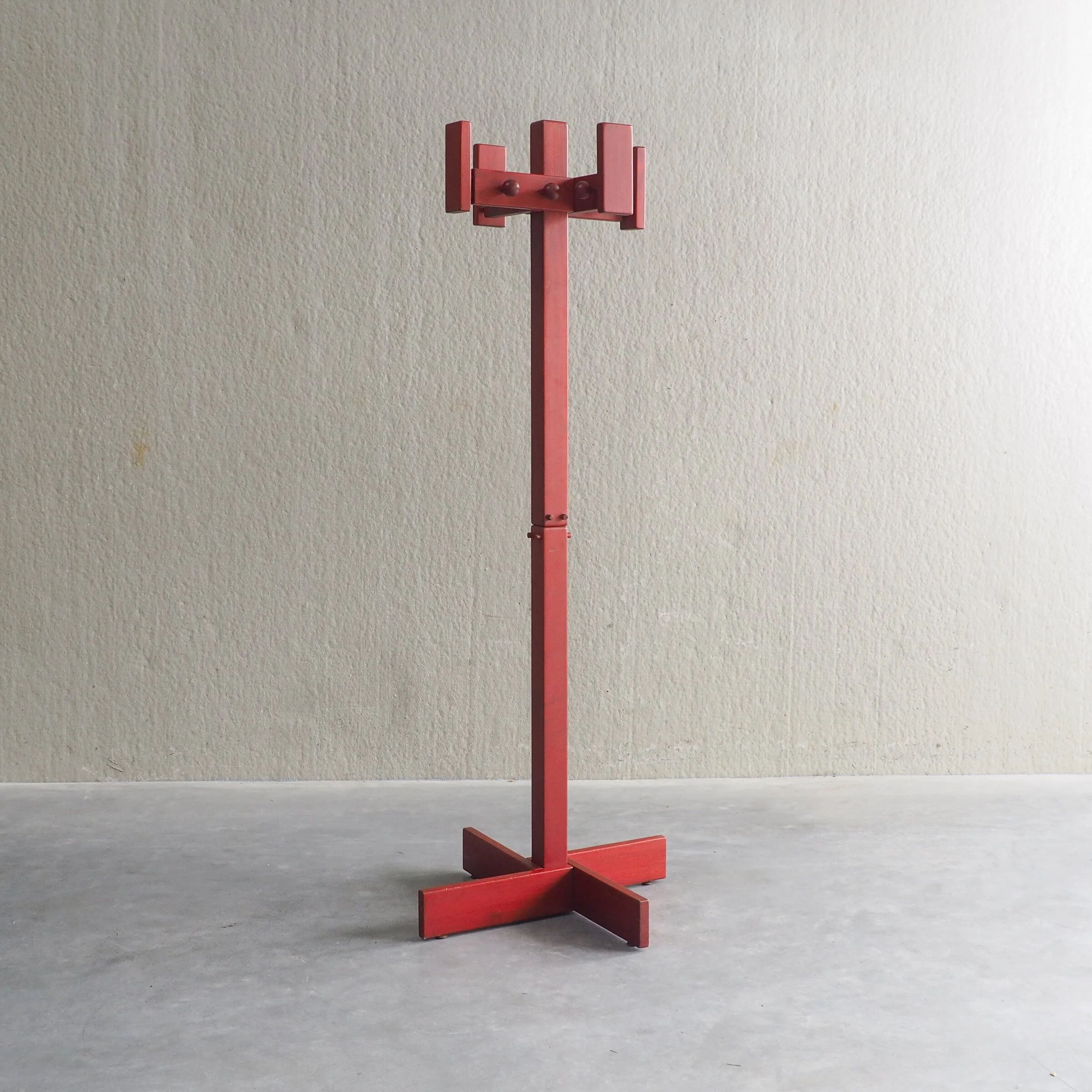 Postmodern red stained pine wood coat hanger
