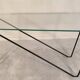 Superb asymmetrical coffee table AIRBORNE 1950s glass and lacquered metal.