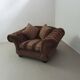 Large weighty love seat with the original matching cushions. Marked "Handmade in Holland"