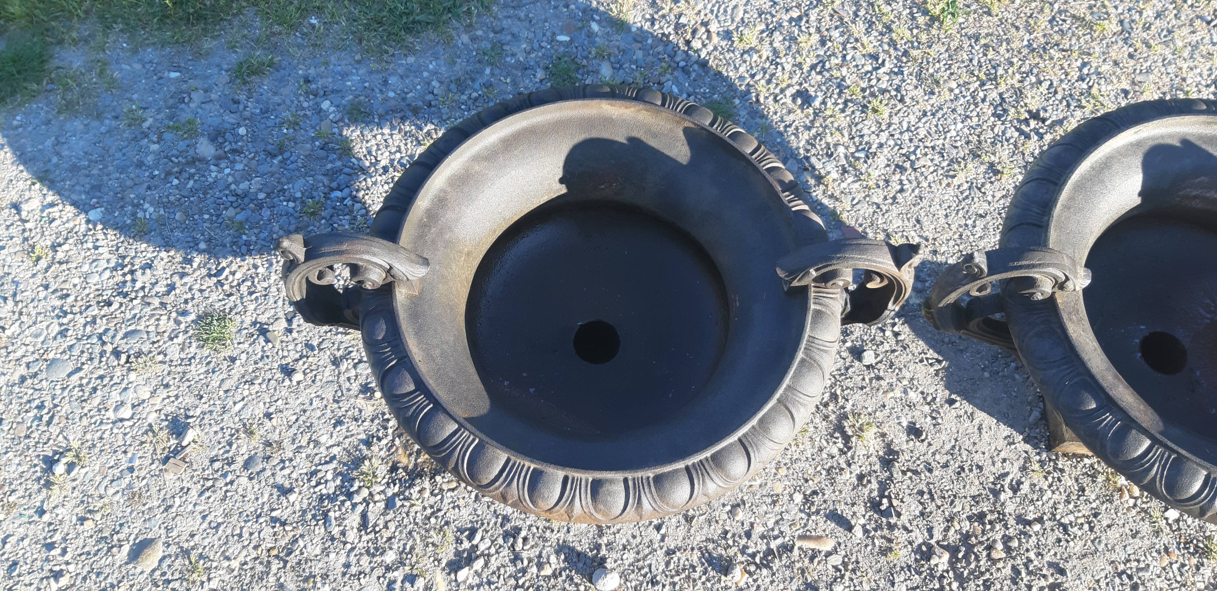 Pair of cast ear vases