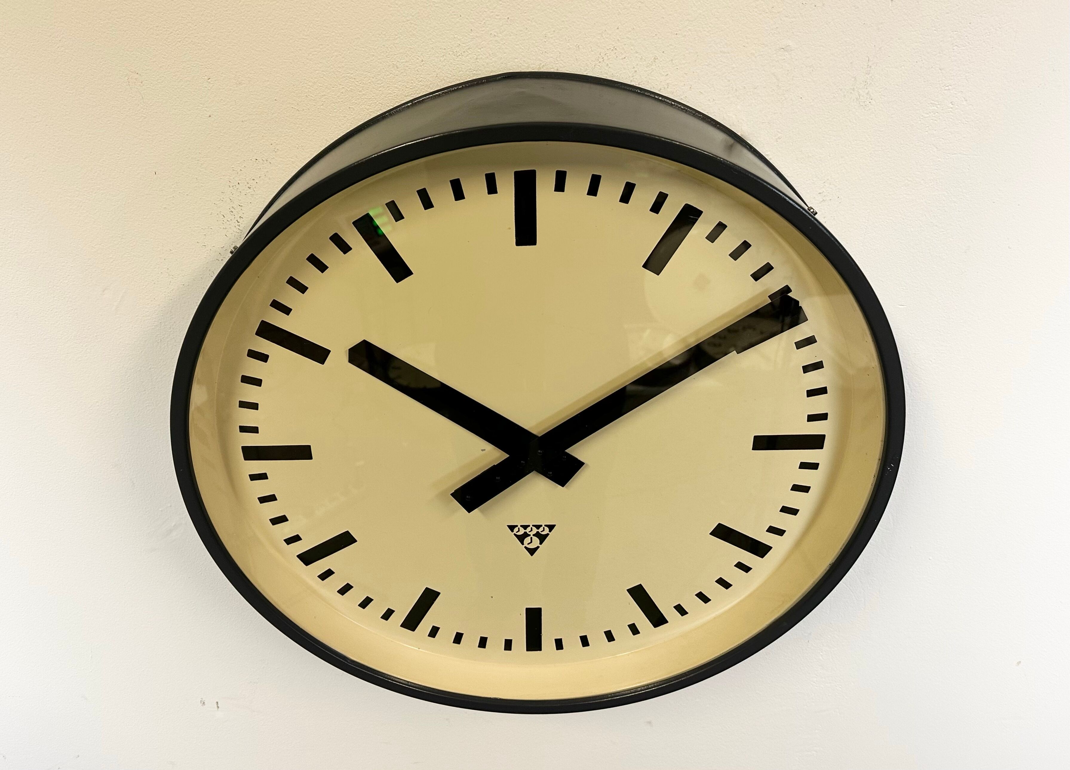 Grey industrial factory wall clock from pragotron, 1960s