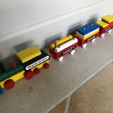 Small vintage train in multicolored wood