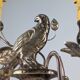 Pair of wall sconces with parrots and leaves