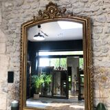 Old mirror 139cm/ 91cm Louis-Philippe with pediment period early 19th, presence of gold leaf.