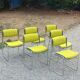 Set of 6 designer chairs with wooden seats and backs, chrome legs.
