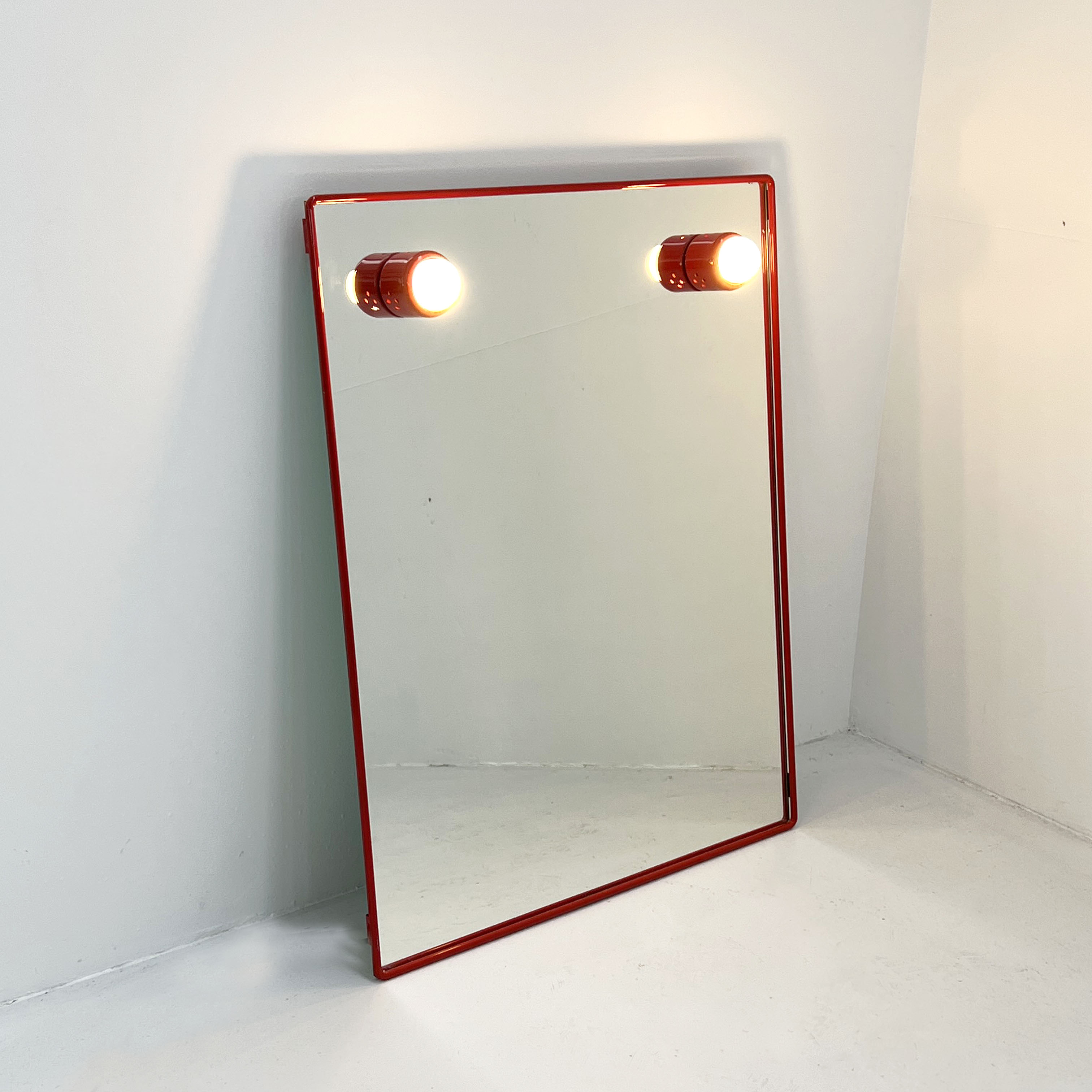Mirror with red metal bulbs, 1970