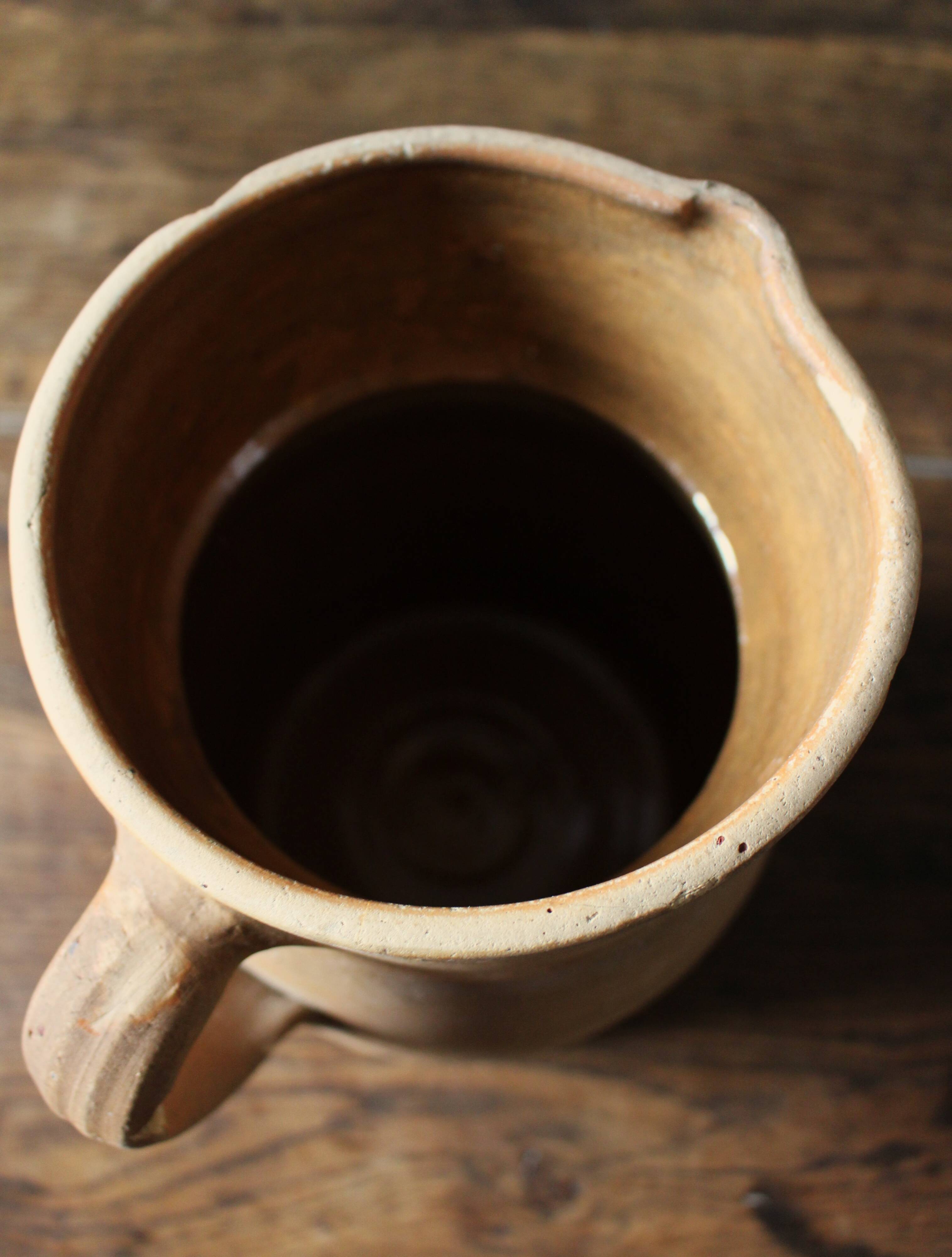 Vintage artisanal terracotta jug
