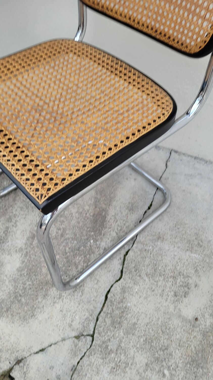 Pair of chairs by Marcel Breuer in black canework model B32 signed Italy