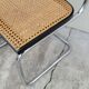 Pair of chairs by Marcel Breuer in black canework model B32 signed Italy