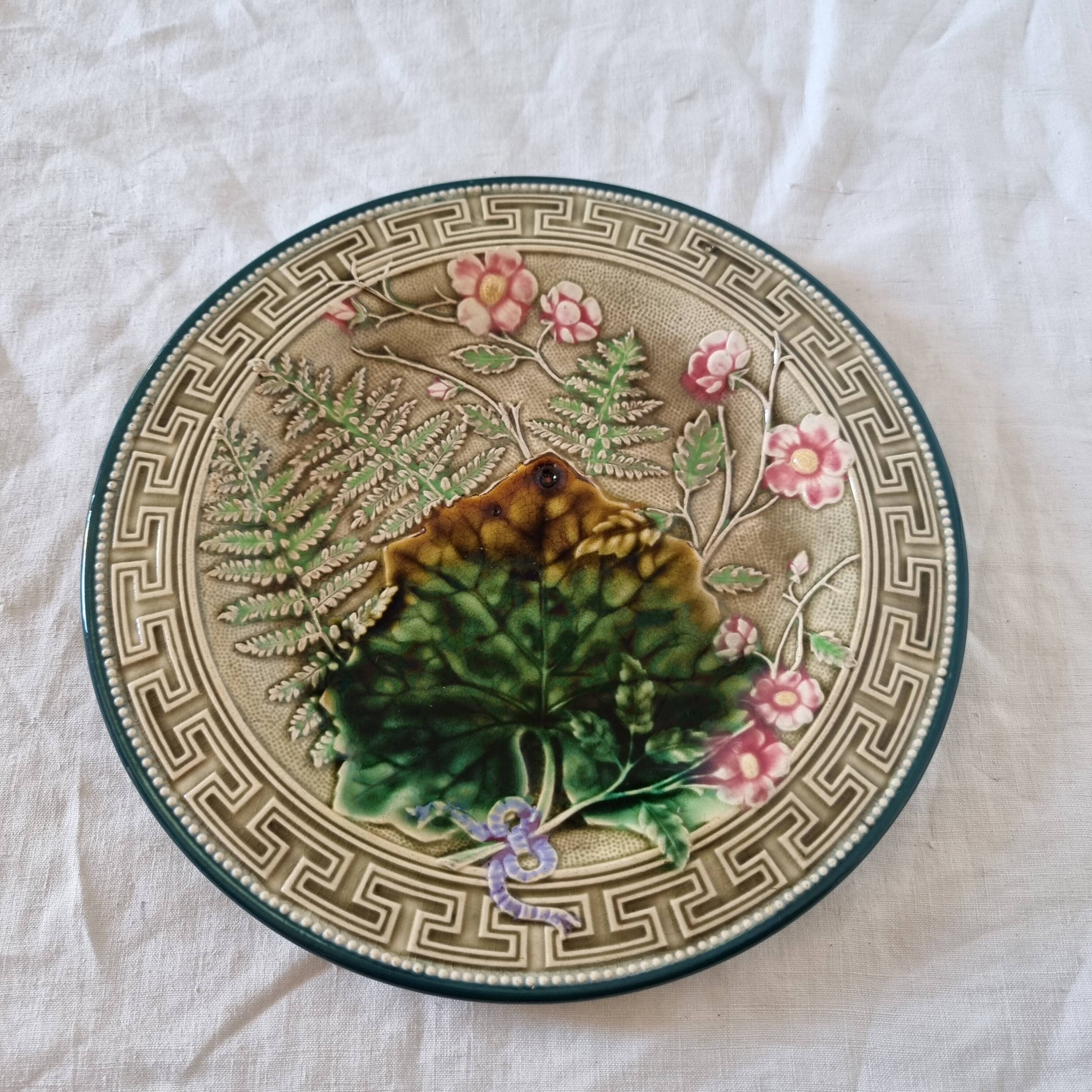 Choisy Le Roi majolica or barbotine dish decorated with leaves and pink flowers from the 19th century