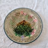 Choisy Le Roi majolica or barbotine dish decorated with leaves and pink flowers from the 19th century