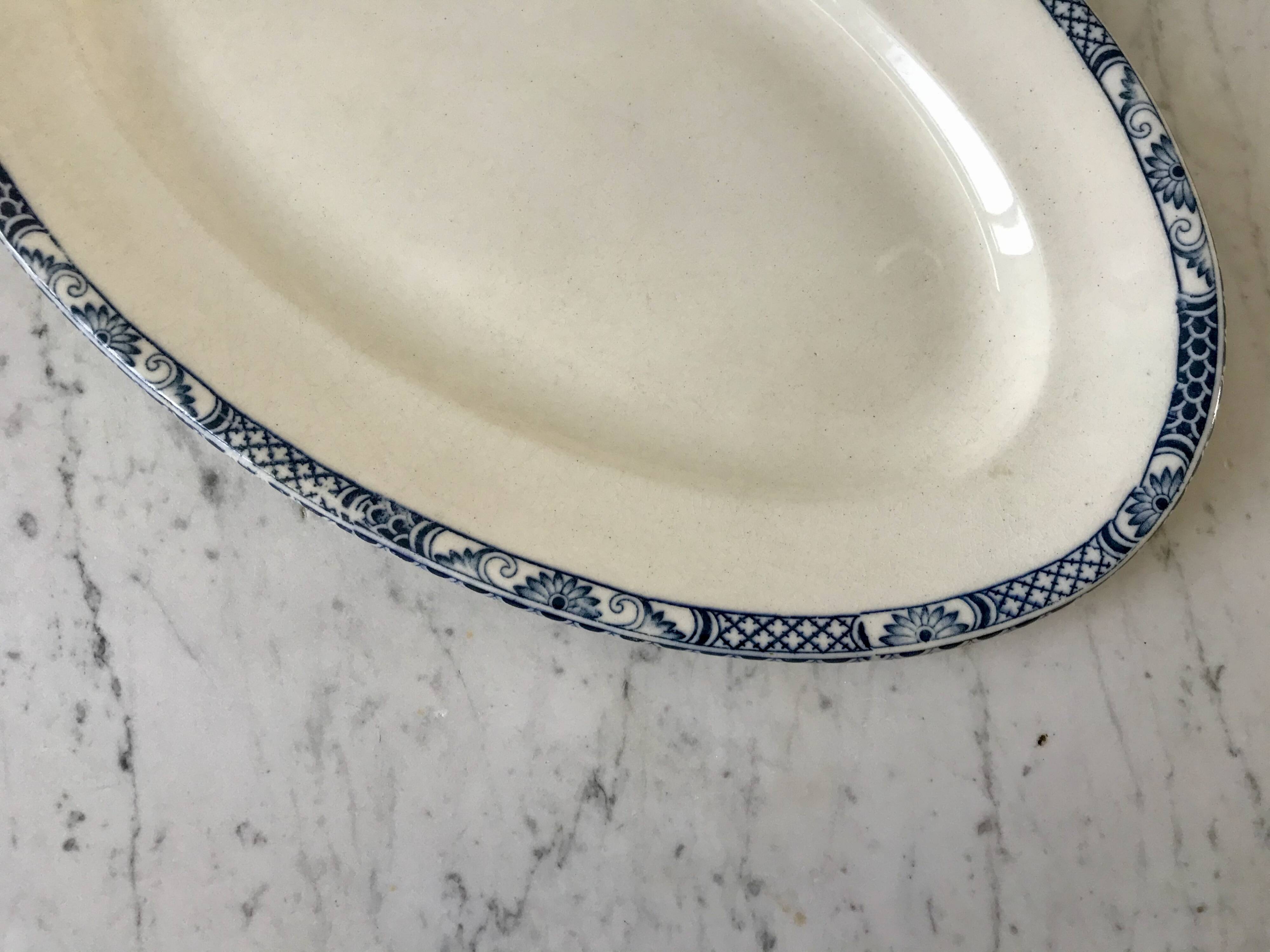 Oval dish in terre de fer bleu xixth