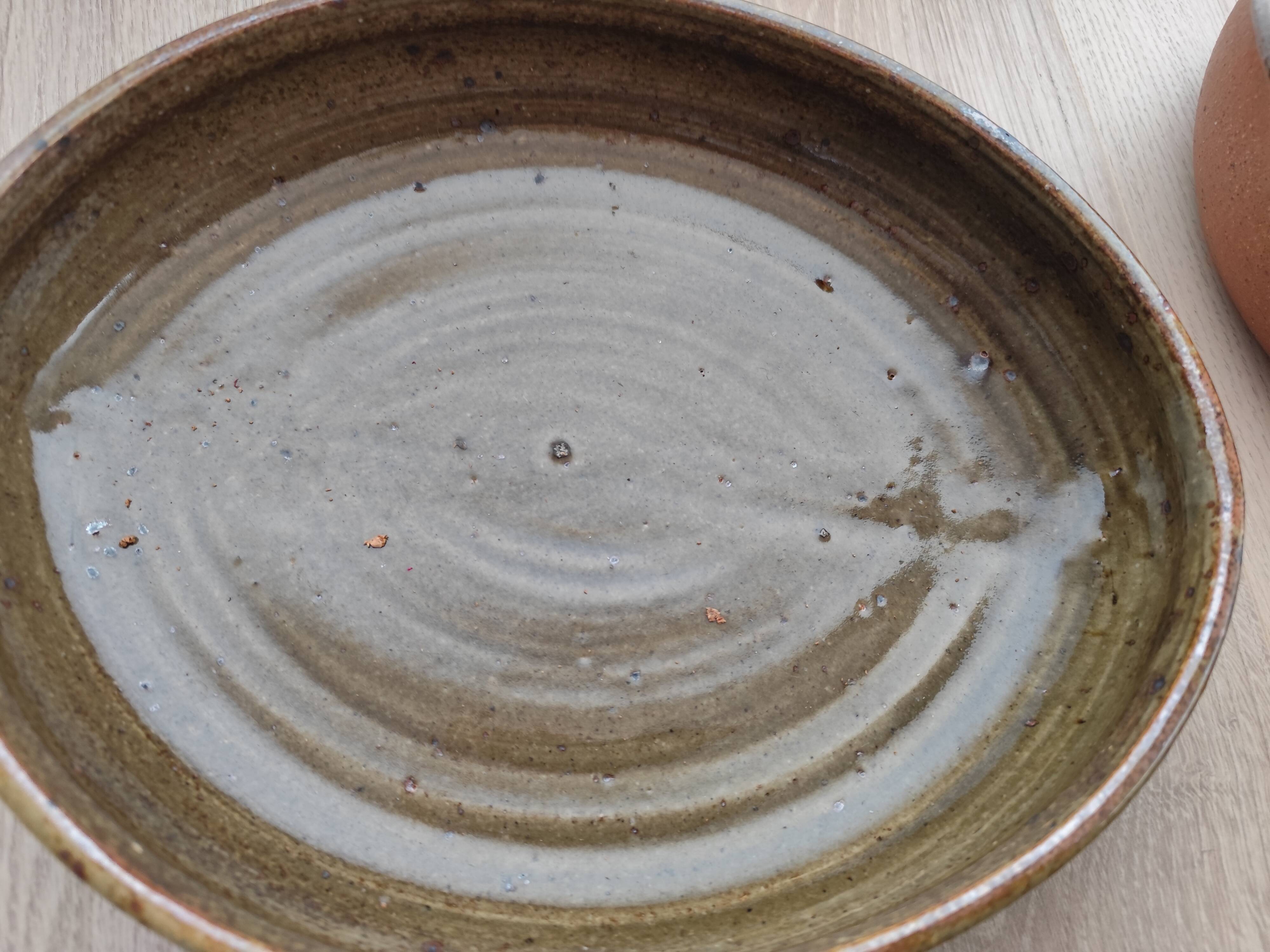 Antique stamped stoneware artisan service