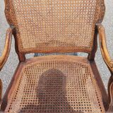 Fauteuil canné sculpté style Régence