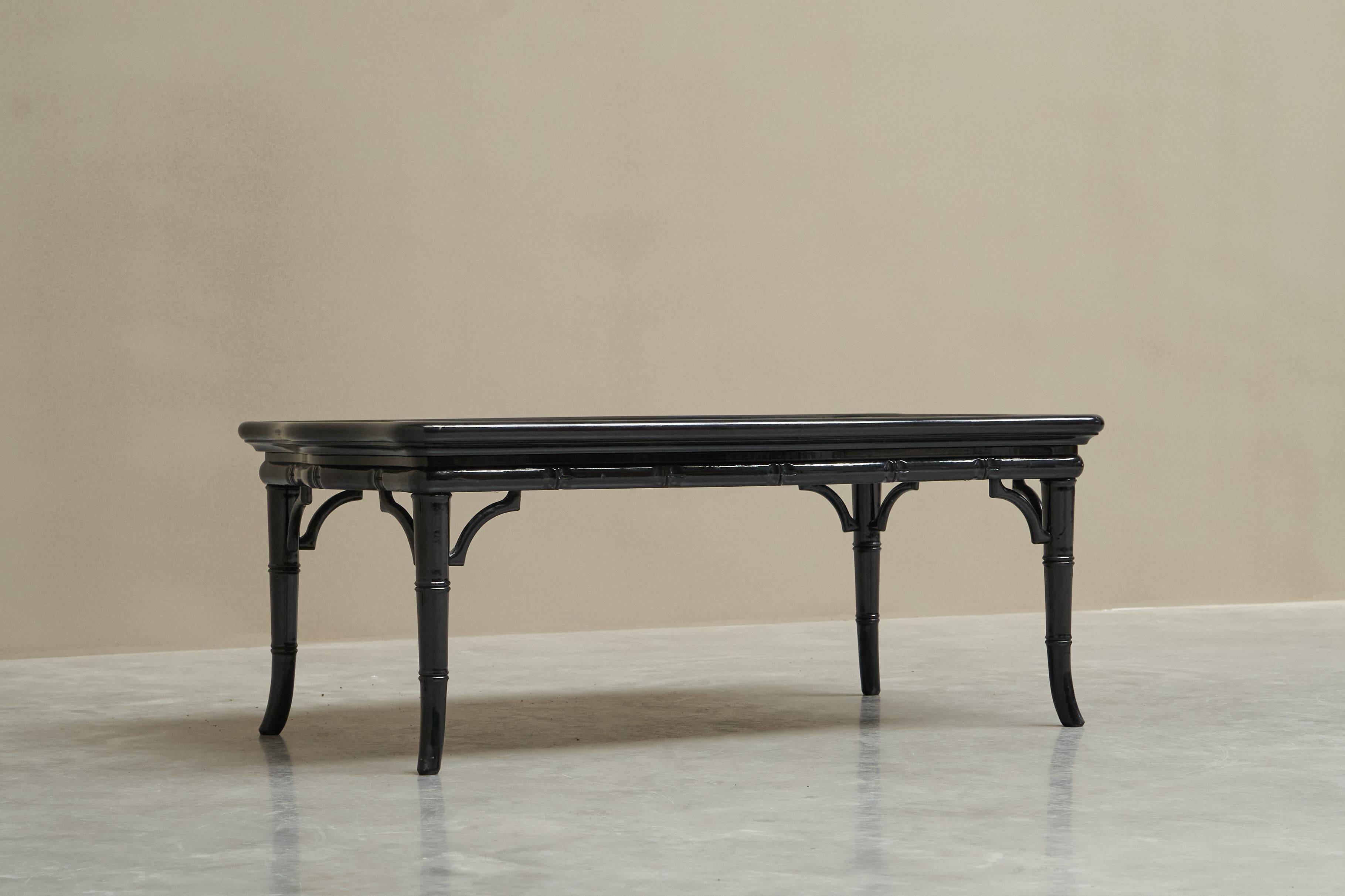 Coffee table in artificial bamboo, black lacquered wood and glass, 1960s.