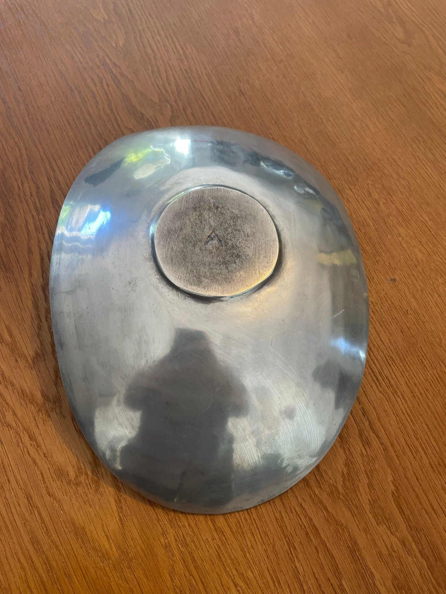 Elegant forged aluminium catchall.