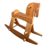 Vintage rocking horse made of solid pine