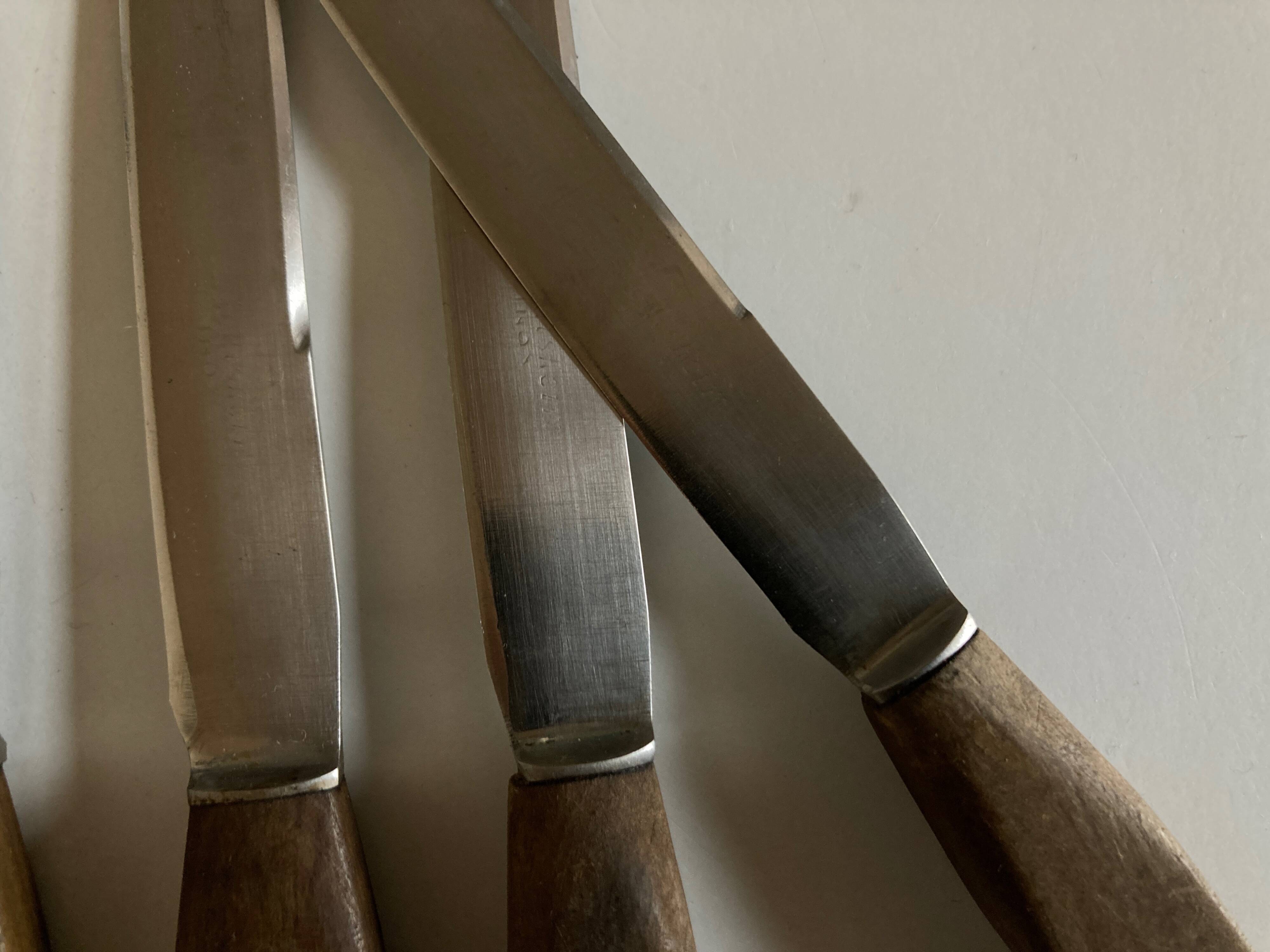 Set of 8 Scandinavian table knives 1960 wooden handle